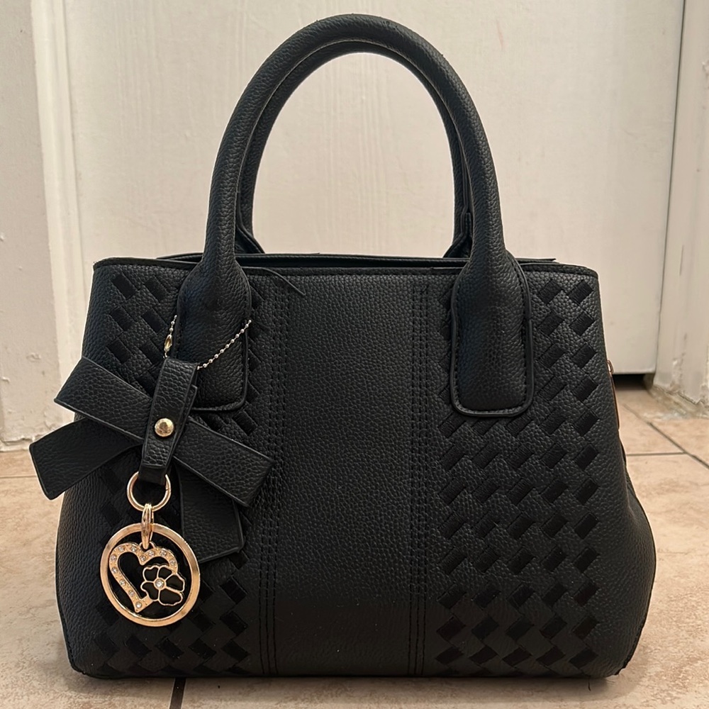 Women’s black purse.